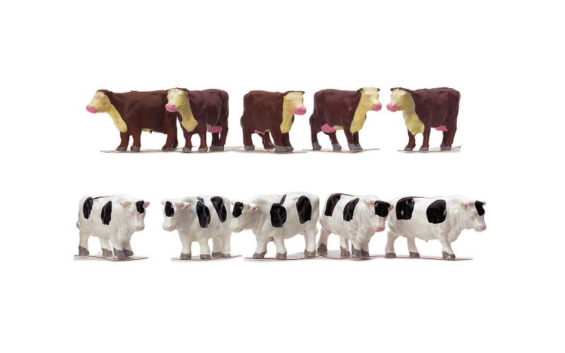 Set of 10 detailed model cows in 1/76 scale, perfect for enhancing miniature train layouts and rural scenes.