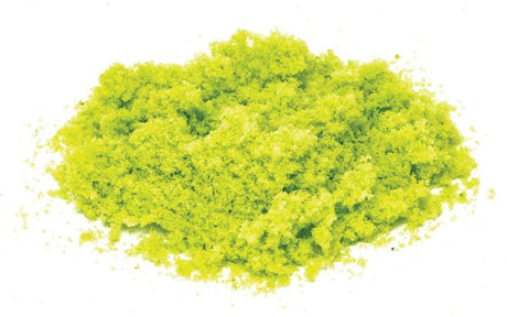 Bright green flockage for model scenery, perfect for enhancing dioramas and train layouts with realistic grass effects.