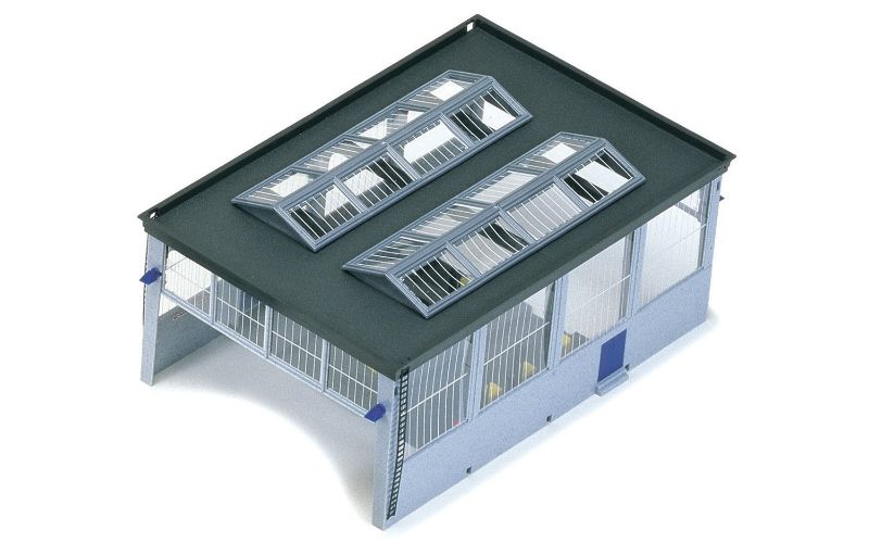 Hornby Diesel Maintenance Depot kit featuring a twin track building with filling pumps and drums for model train setups.
