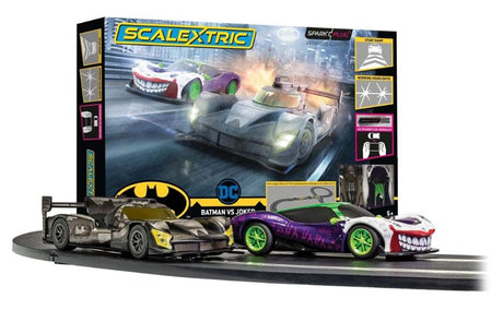 Slot Cars & Accessories Set featuring Batman vs Joker with innovative Spark Plug Dongles for wireless control, 1:32 scale.