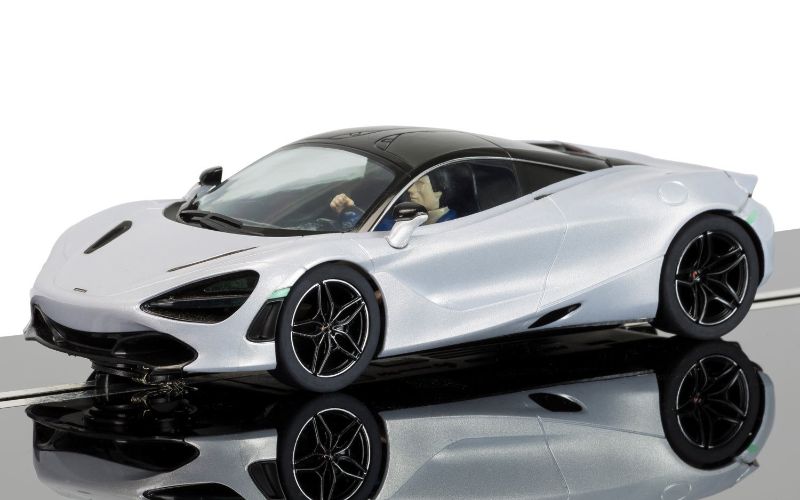 White McLaren 720S slot car, 1/32 scale, featuring twin-turbo V8 engine and precision engineering for optimal performance.
