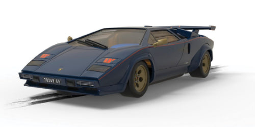 Slot car replica of the Lamborghini Countach Walter Wolf, featuring iconic blue and gold livery with luxurious interior details.