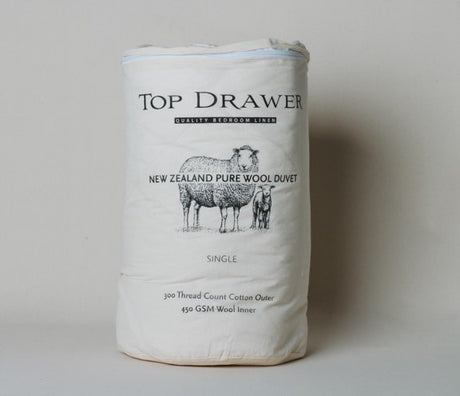 Luxurious King-sized duvet made from 100% New Zealand wool for year-round comfort and temperature regulation.