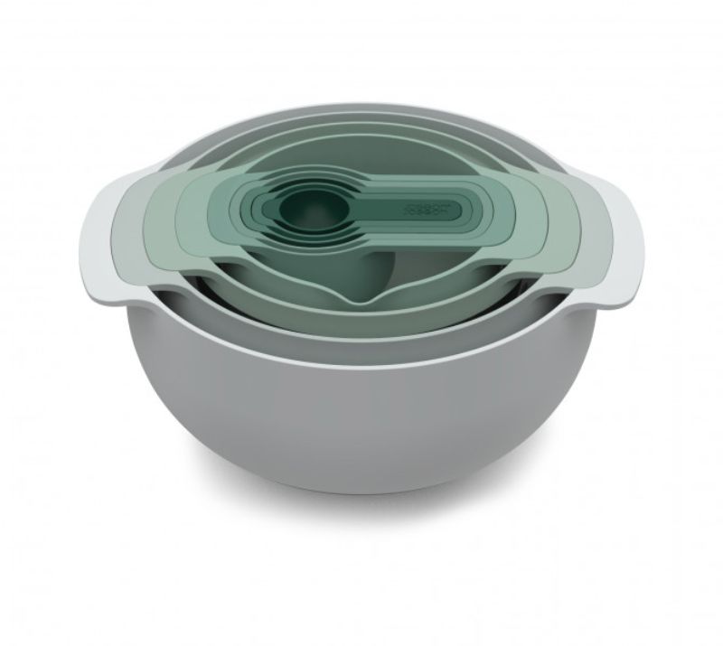 Joseph Joseph Nest 9 Piece Bowls Set in sage green featuring space-saving design, mixing bowl, colander, sieve, and measuring cups.