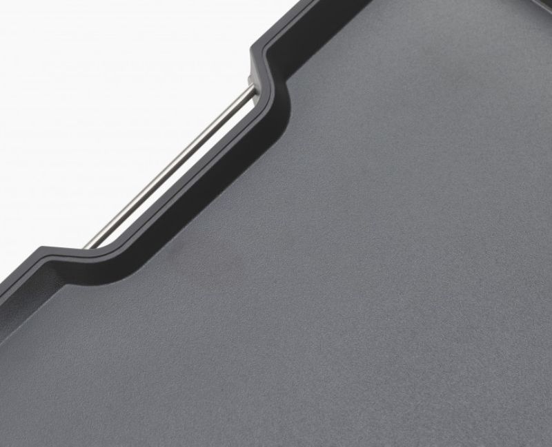 Joseph Joseph Cut & Carve Plus XL Black chopping board with angled base, meat grip, and easy-pour corners for mess-free cooking.