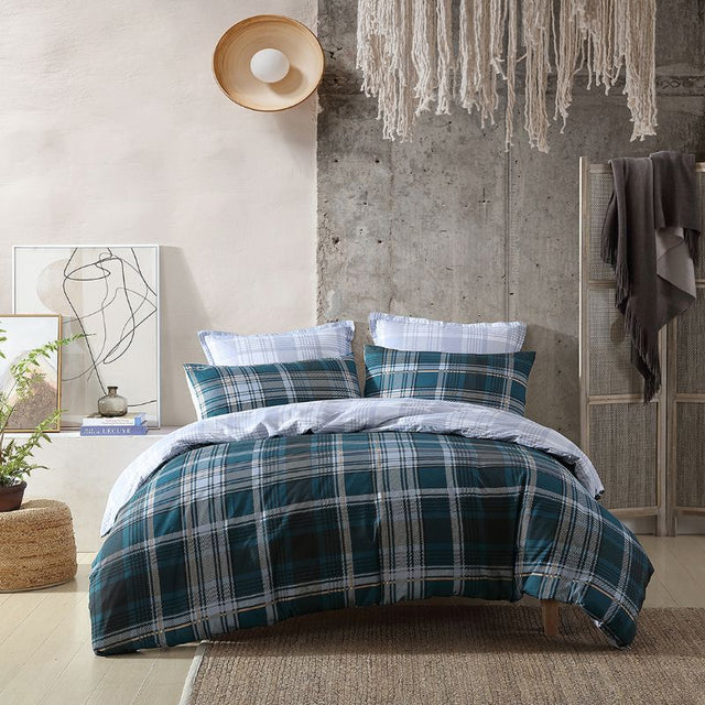 Chic teal and silver check duvet cover set from LOGAN & MASON, featuring softness and reversible design for stylish bedding.