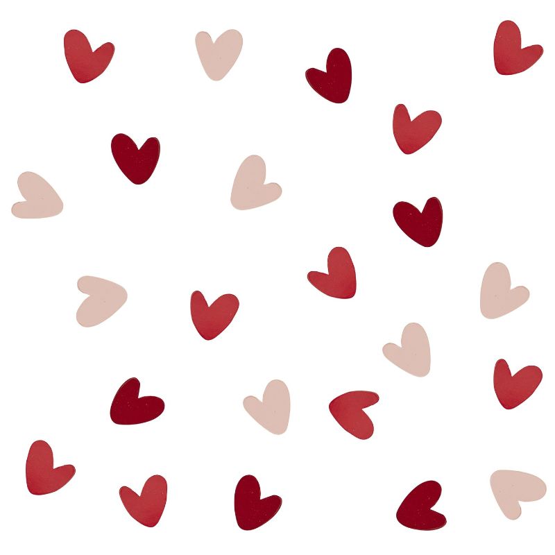 Biodegradable heart confetti in pink and red, perfect for romantic events and eco-friendly celebrations.