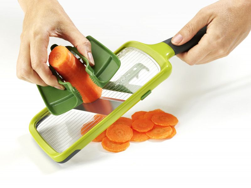 Joseph Joseph Multi-Grip Mandoline in green, featuring adjustable slice thickness and three unique grip styles for versatile slicing.
