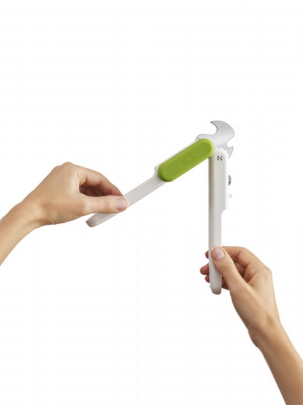 Joseph Joseph Pivot 3-in-1 Can Opener in white and green, featuring a stainless-steel cutter, bottle opener, and ring-pull lifter.