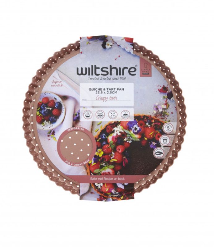 Wiltshire Perforated Round Quiche pan in stylish rose gold, perfect for baking savory quiches and sweet tarts.