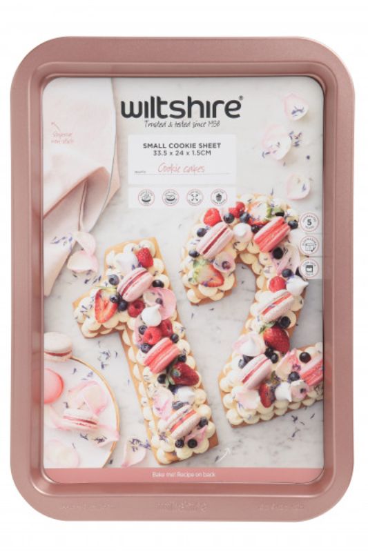 Wiltshire Rose Gold Cookie Sheet, non-stick and dishwasher safe, ideal for baking cookies and cookie cakes at home.