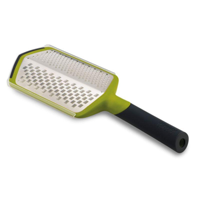 Joseph Joseph Twist Grater in green features coarse and fine blades, ergonomic handle, and a protective sheath for easy storage.