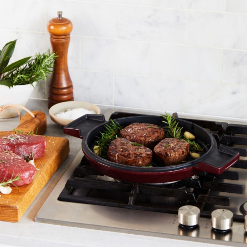 Stanley Rogers 28cm Cast Iron French Oven in elegant Bordeaux, featuring a durable enamel finish and versatile grill lid.