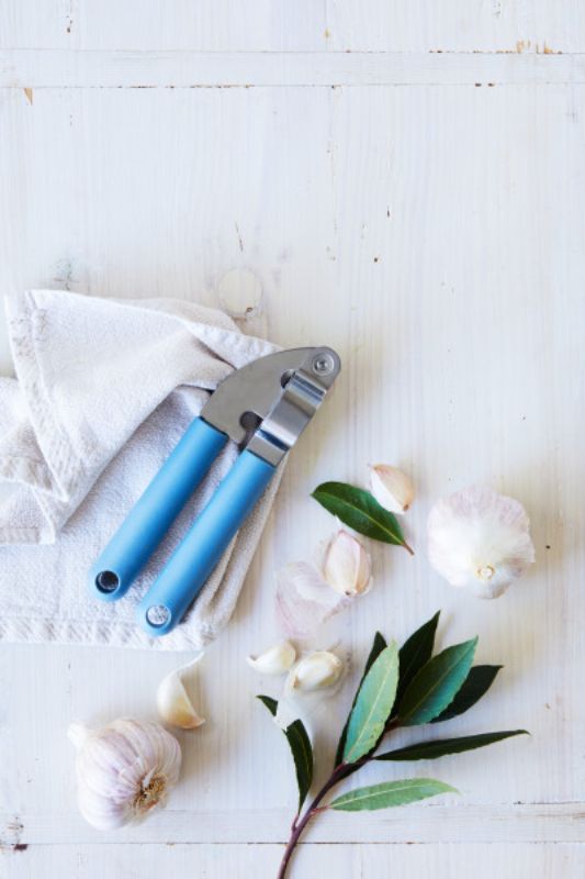 Wiltshire Eco Friendly Garlic Press featuring stainless steel and bio-based handle for sustainable cooking.