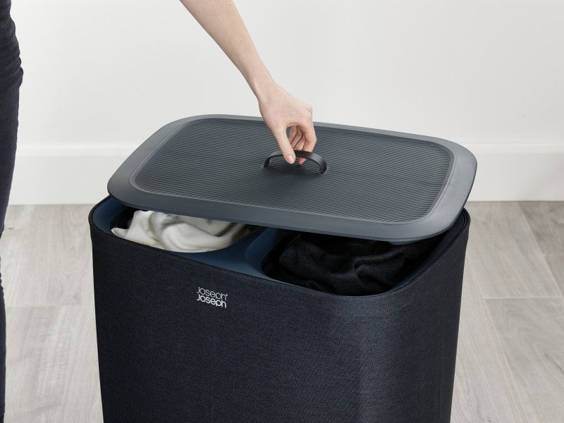 Joseph Joseph Tota 90-litre Laundry Basket in Carbon Black with dual 45-litre compartments for easy fabric separation.