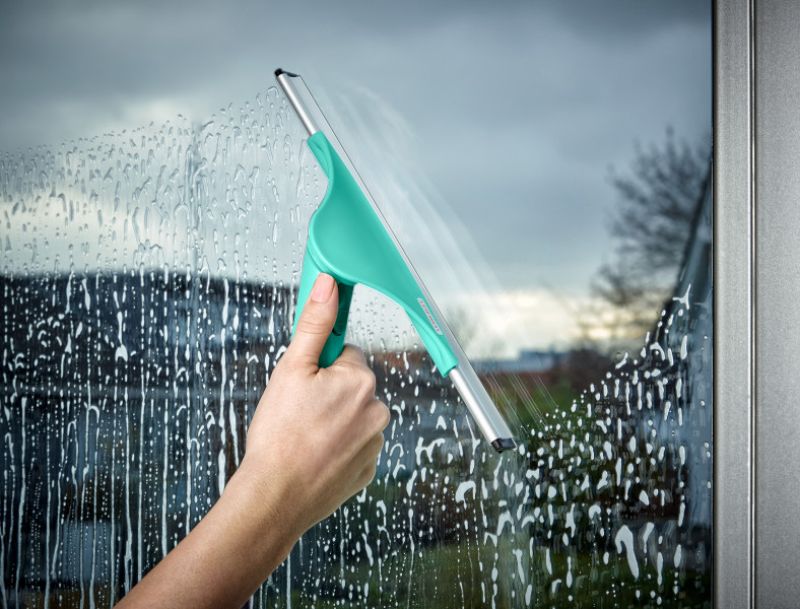 Leifheit 28cm Click System Squeegee for streak-free window cleaning, featuring adjustable joint and versatile handle compatibility.