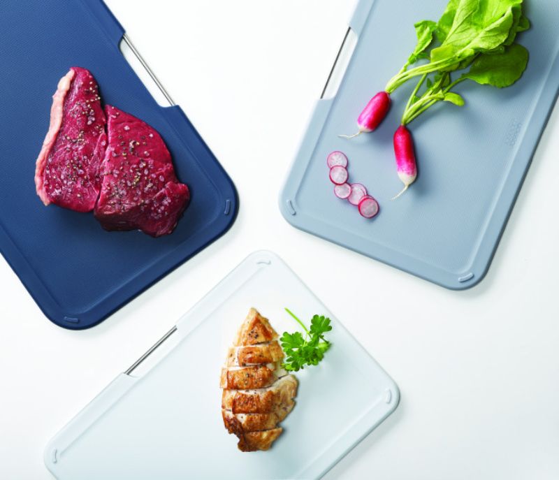 Joseph Joseph Nest Boards 3-piece set in grey, featuring color-coded chopping boards for safe food prep and stylish storage.