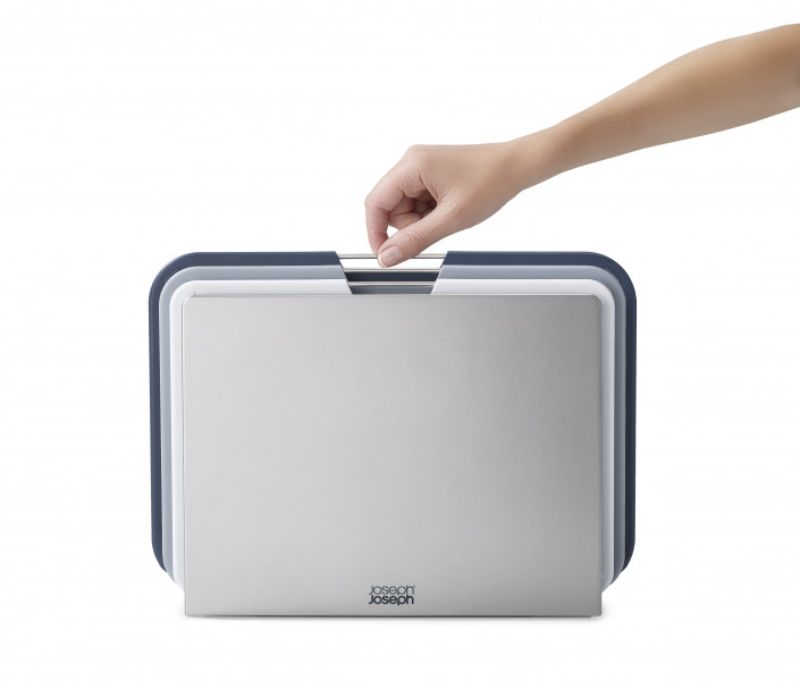 Joseph Joseph Nest Boards Large Set in Grey features three color-coded chopping boards with stainless-steel bars and non-slip feet.