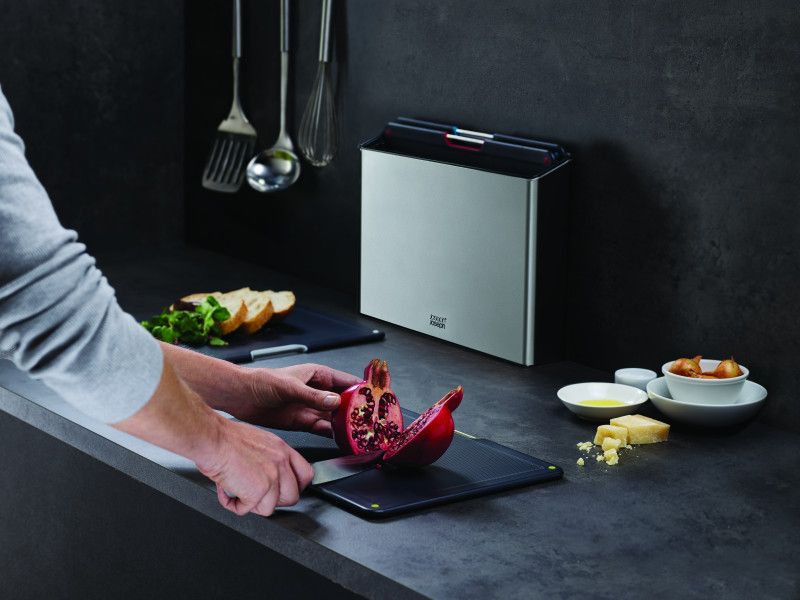 Joseph Joseph Folio Steel 4-piece chopping board set in stainless steel with color-coded boards and stylish case.