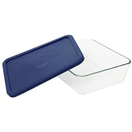 Glass 3-cup rectangular storage container with a secure blue lid, ideal for fresh food storage and microwave-safe use.