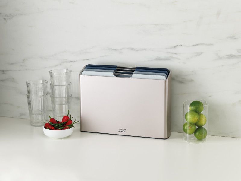Joseph Joseph Folio Large Chopping Board Set in Sky, features color-coded boards in a sleek storage case for safe, organized chopping.