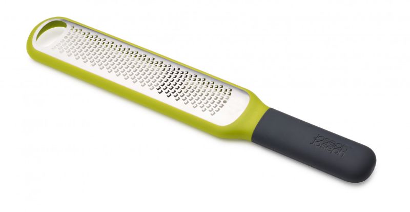 Joseph Joseph Zester W Blade Wiper with ergonomic handle and integrated cleaning blade for easy zest collection.