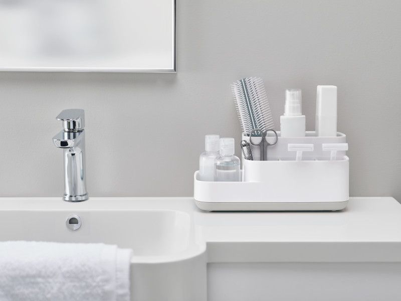 Joseph Joseph EasyStore Bathroom Caddy in Grey/White, featuring multiple compartments for organized grooming essentials.