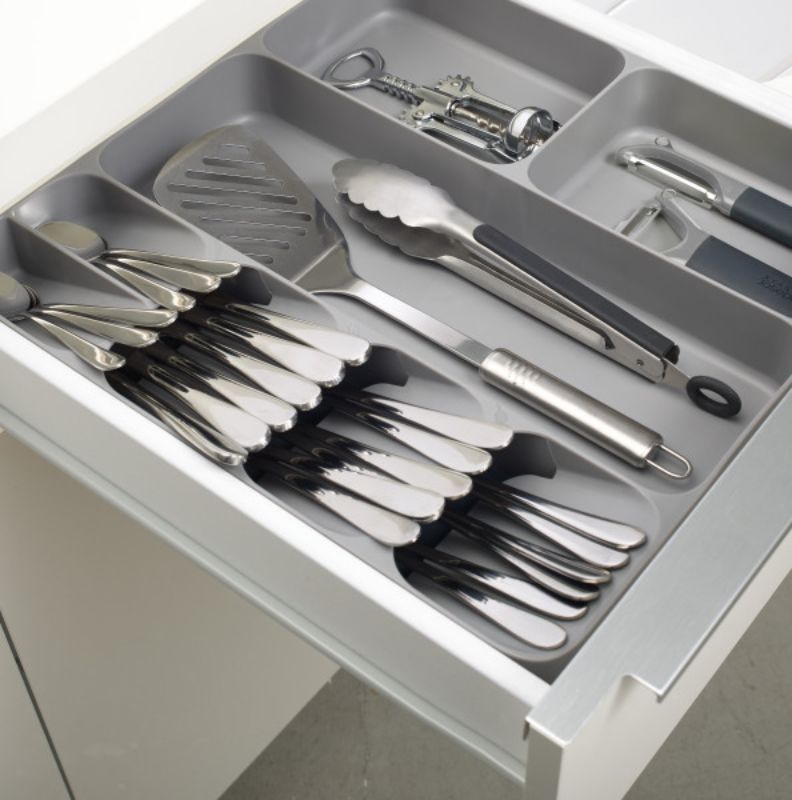 Joseph Joseph DrawerStore cutlery organiser in grey, featuring five compartments for efficient kitchen storage.