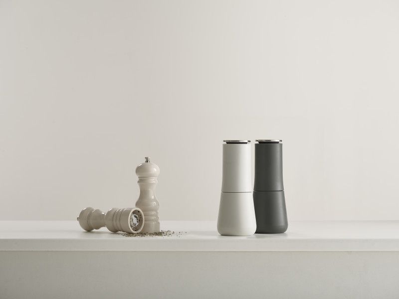 Joseph Joseph Milltop Salt and Pepper Set with inverted design for mess-free seasoning and adjustable grind size.