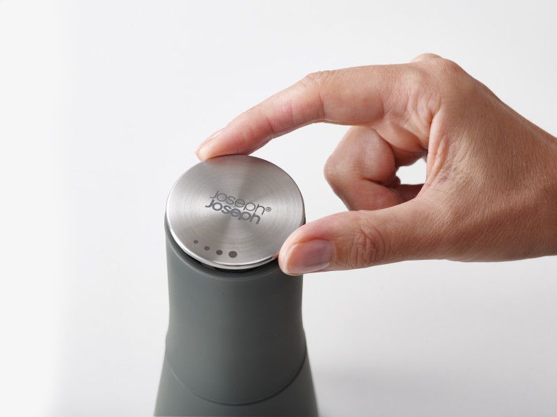 Joseph Joseph Milltop Salt and Pepper Set features an inverted design for mess-free seasoning and a ceramic grinding mechanism.