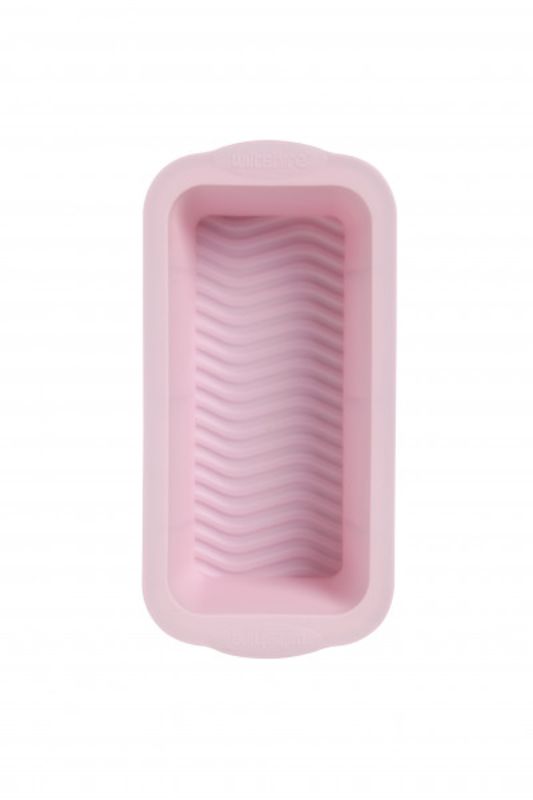 Pale pink flexible loaf pan, perfect for baking meat loaf and banana bread with a non-stick surface for easy release.