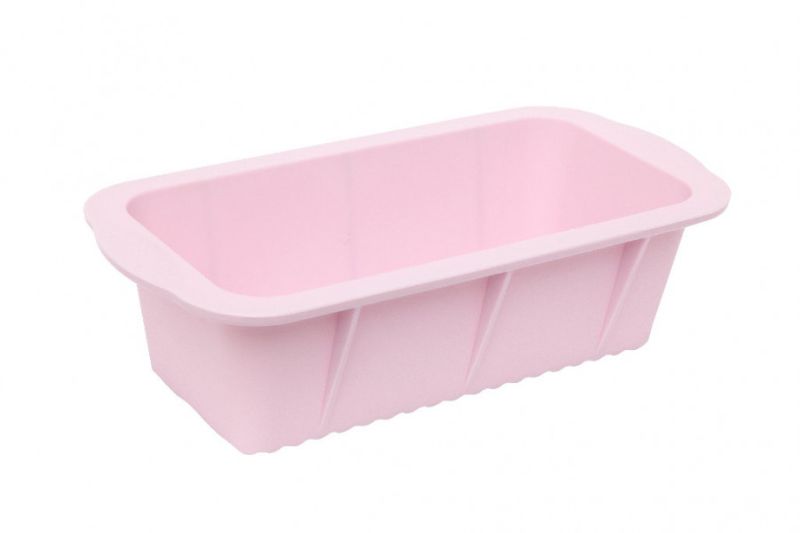 Pale pink flexible loaf pan for easy baking of meat loaf, banana bread, and more; non-stick and dishwasher safe.