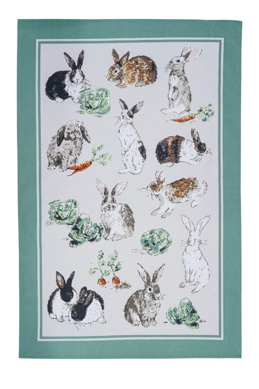 Cotton tea towel featuring playful rabbits in a vegetable patch design, crafted from 65% recycled materials.