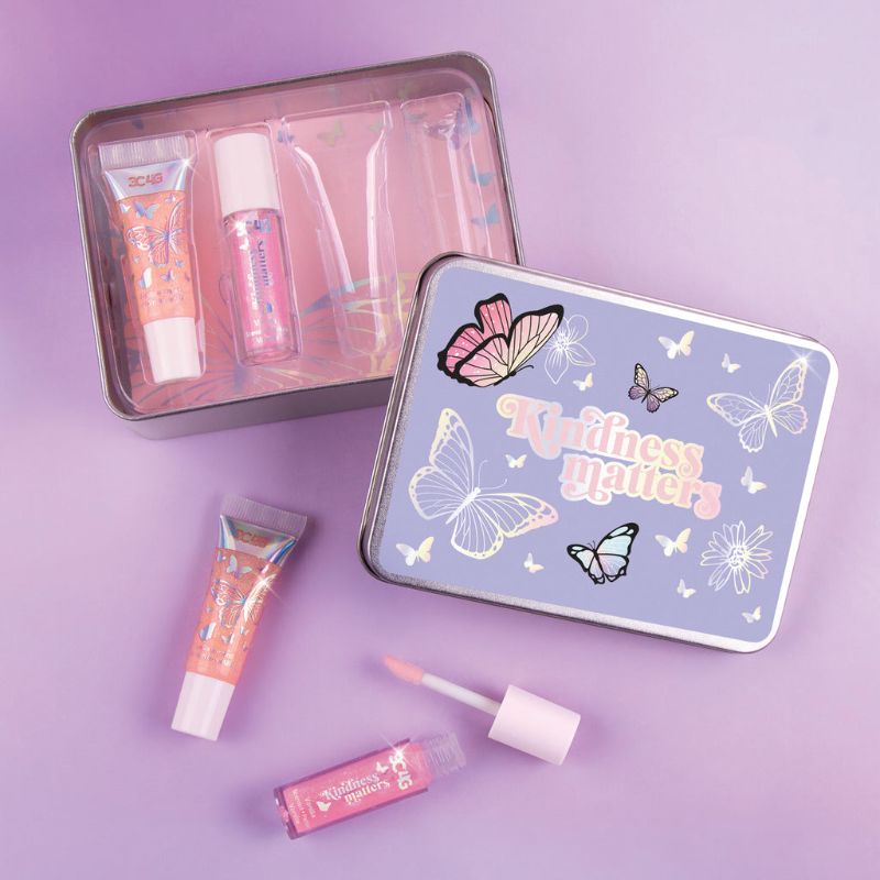 Butterfly Kisses Lip Set: 4 luxurious glosses in colorful packaging for vibrant shine and hydration in a reusable tin.