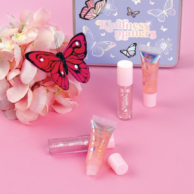 Butterfly Kisses Lip Set: 4 luxurious glosses in wand and tube forms, beautifully packaged in a butterfly-themed tin.