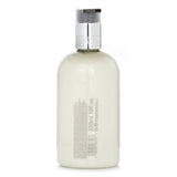 Molton Brown Delicious Rhubarb & Rose Hand Lotion 300ml/10oz