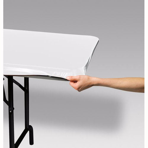 Durable white plastic table cover with stayput feature, ideal for protecting tables at various events.