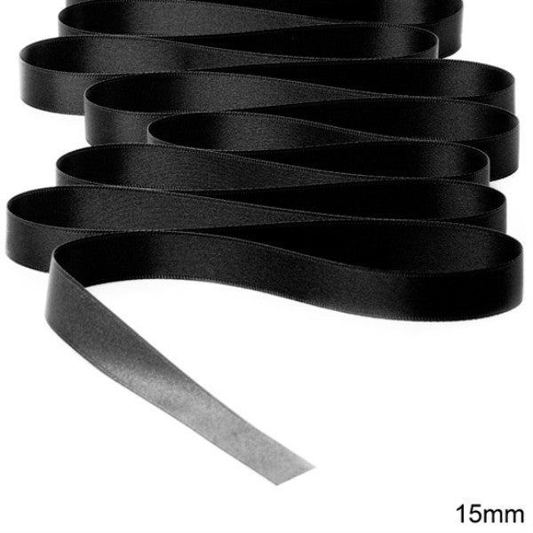 Luxurious 15mm double face satin ribbon in black, perfect for elegant gift wrapping and crafting projects.