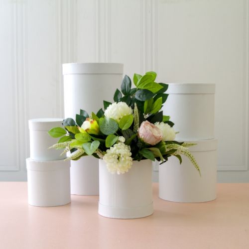 Elegant round white flower box set of 7, perfect for floral arrangements or stylish storage solutions.