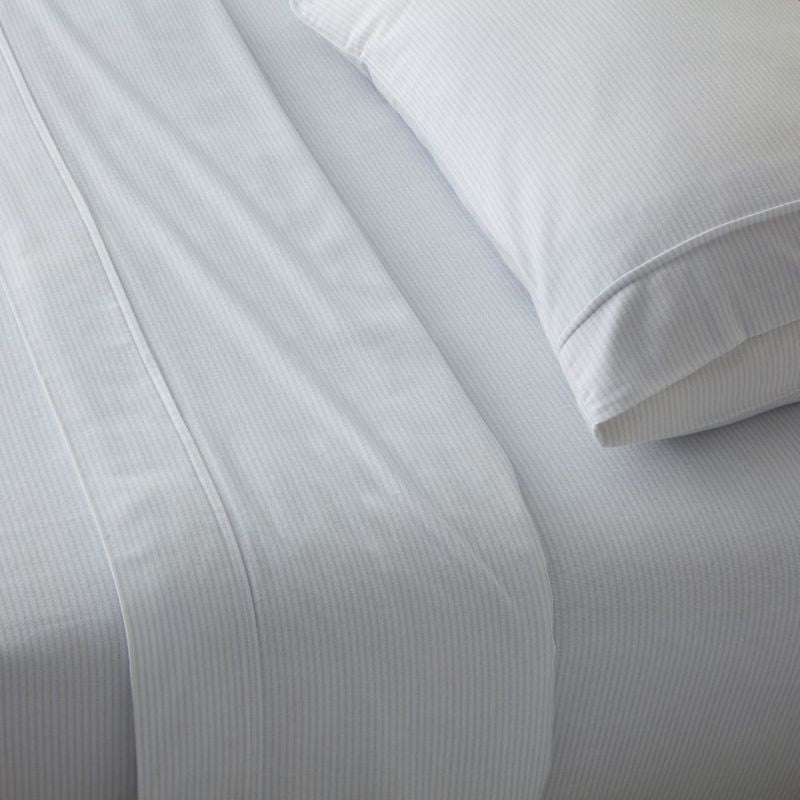 BAKSANA OXFORD Blue Stripe Flannel Sheet Set, crafted from 100% brushed cotton for cozy warmth during winter nights.