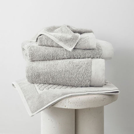 Soft, eco-friendly bamboo bath mat in silver, measuring 51 x 76cm with high absorbency and antibacterial properties.