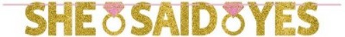Gold and pink glittered banner reading 'She Said Yes', perfect for engagement parties and bridal showers.