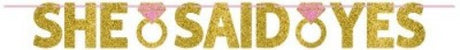 Gold and pink glittered banner reading 'She Said Yes', perfect for engagement parties and bridal showers.
