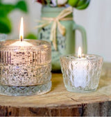 Elegant glass candle holder with diamond pattern, perfect for tea lights and creating a warm ambiance.