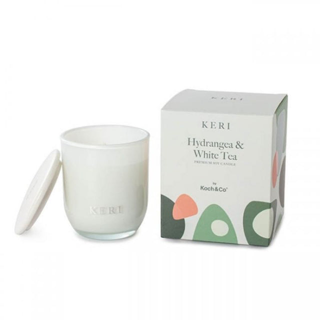 Luxury soy candle featuring hydrangea and white tea scents, burns for 30 hours, perfect for relaxation and home decor.