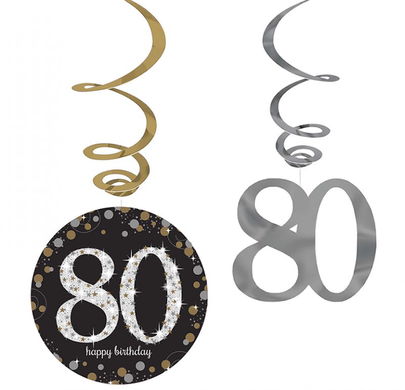 Colorful glittering swirls set for celebrations, featuring foil designs and fun cutouts, ideal for birthdays and events.
