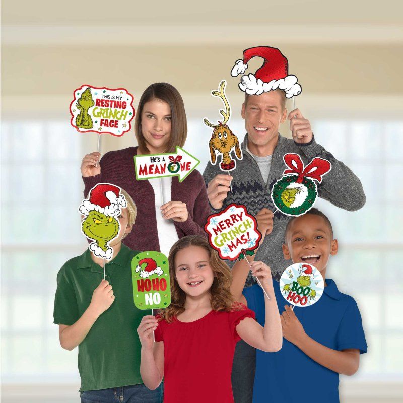 Whimsical Dr. Seuss Grinch photo prop kit with 13 fun props for festive holiday gatherings and family photos.