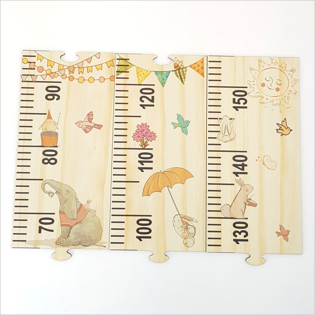 Woodland Party Growth Chart Ruler made of eco-friendly pine veneer, featuring charming animals and interactive puzzle pieces.