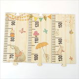 Woodland Party Growth Chart Ruler made of eco-friendly pine veneer, featuring charming animals and interactive puzzle pieces.