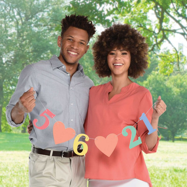 Customisable Due Date Banner with vibrant numbers, hearts, and 3.65m cord for birthdays, baby showers, and weddings.